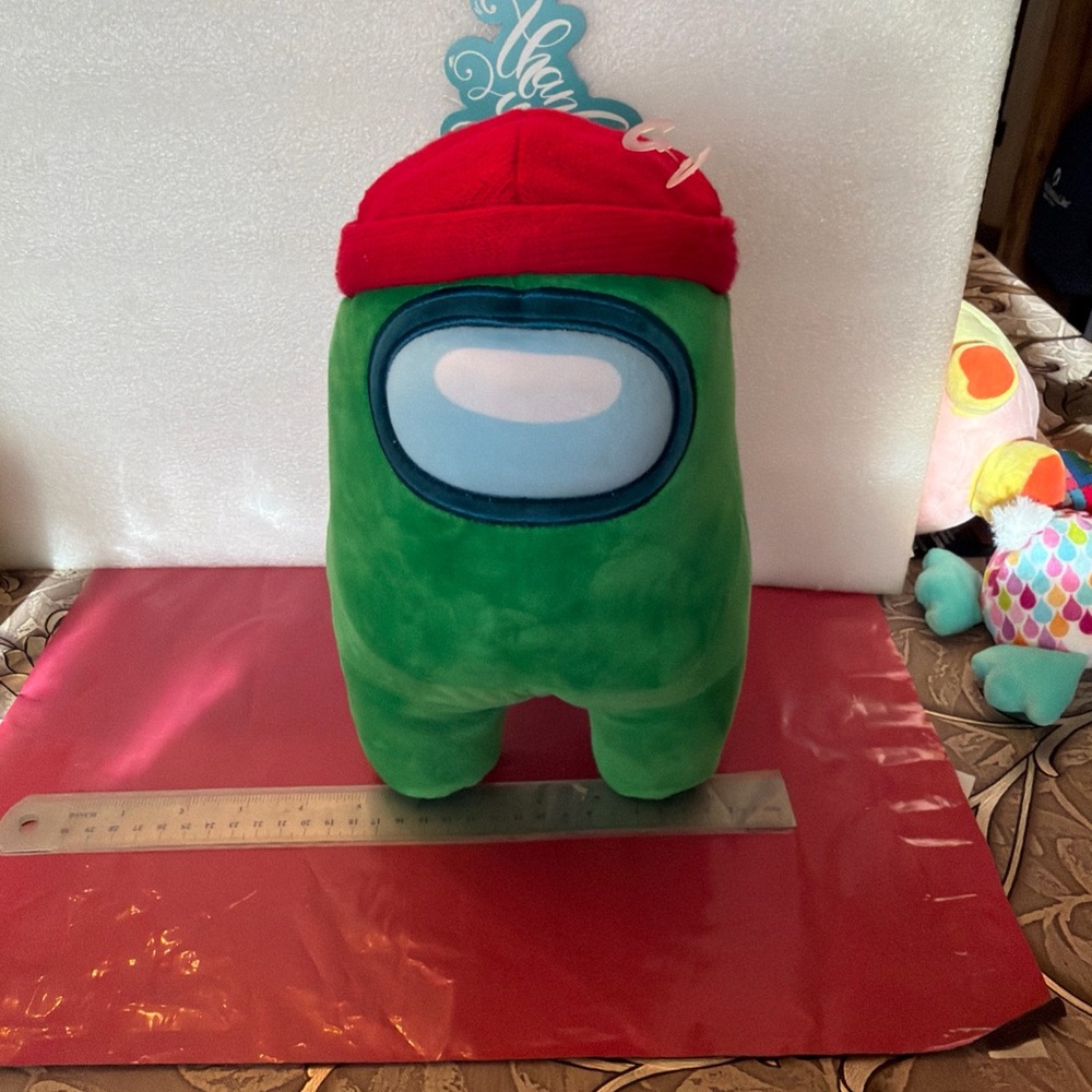 Green and Red Stuffed Toy